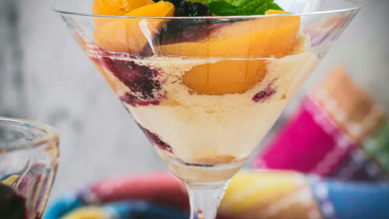 Peach Melba with Raspberry Liqueur Berry Sauce